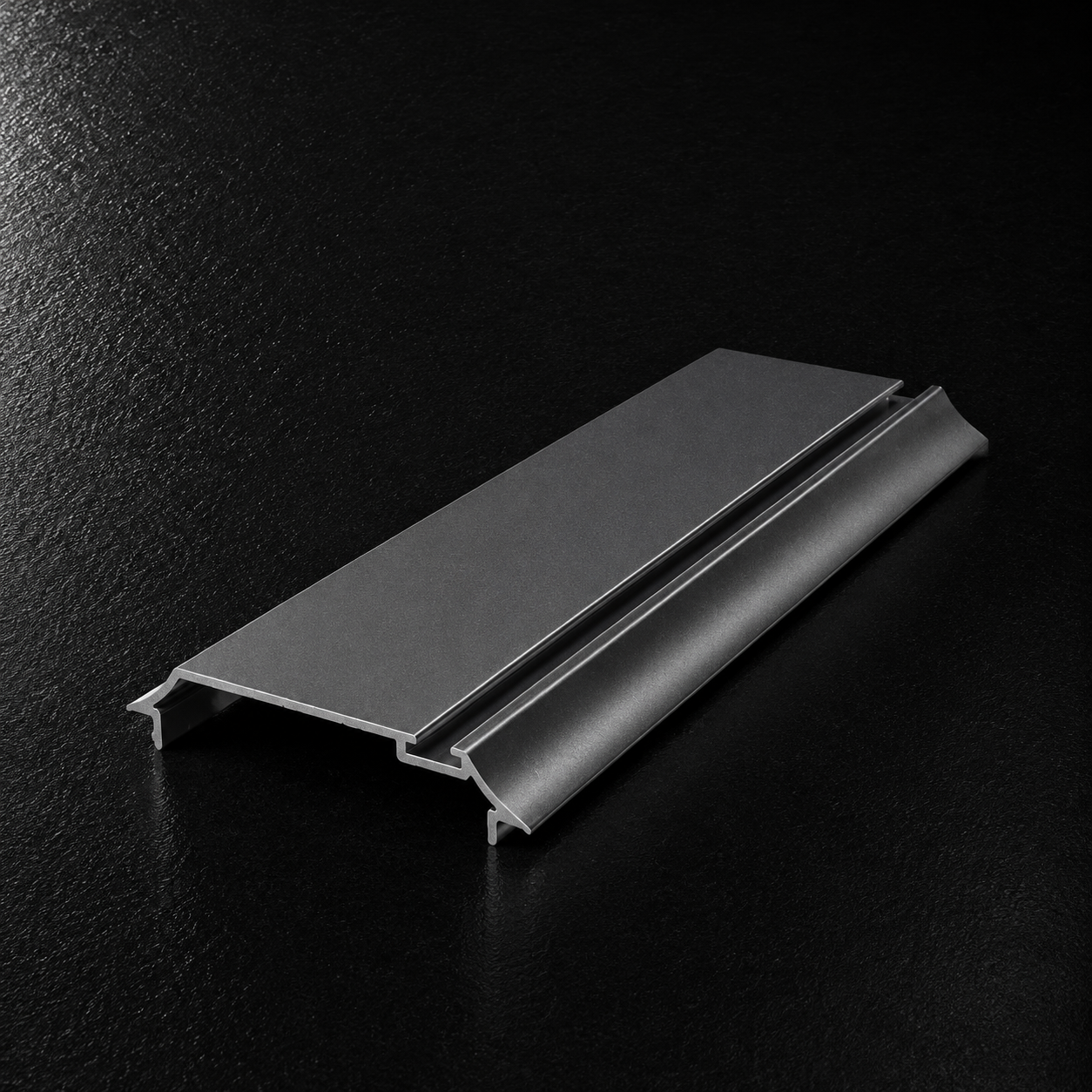 a clean studio product shot on a dark black charco